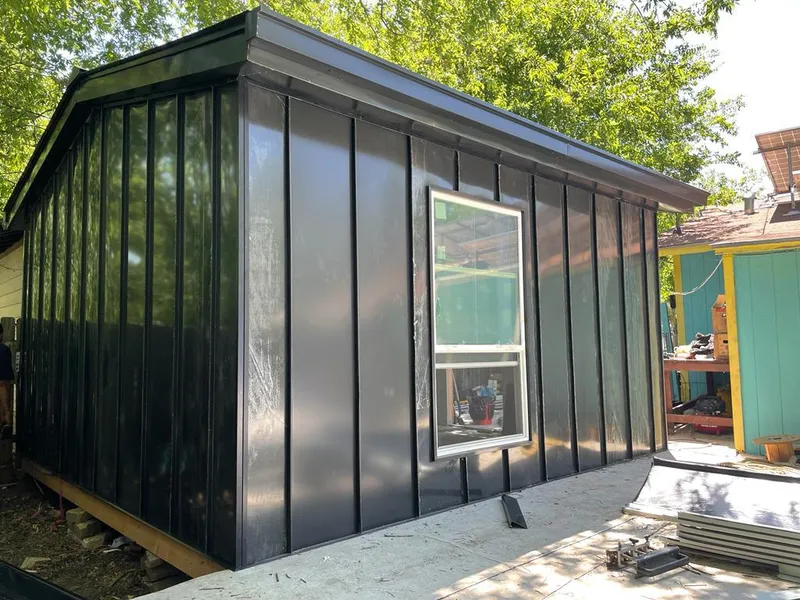 Black standing seam metal wall panels for Roof Inspection in Livonia