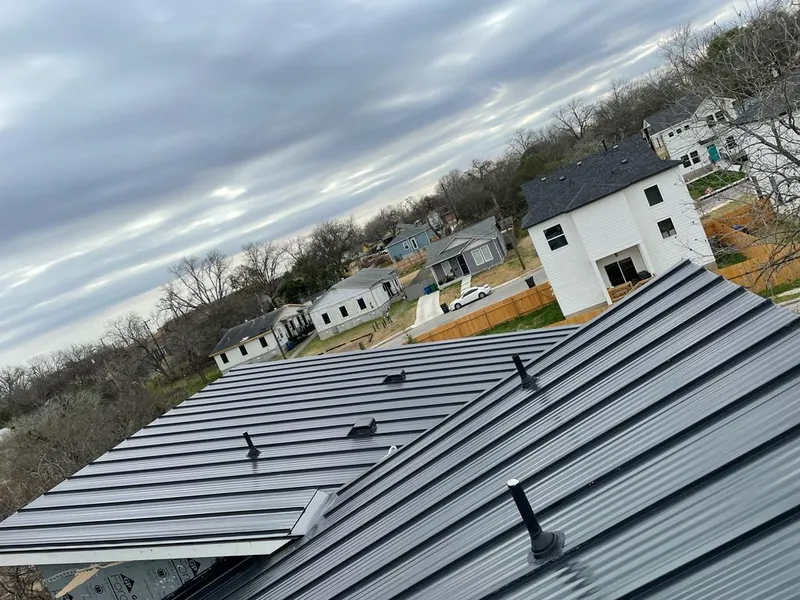 Standing seam metal roof panels with vents for Skylight Repair in Livonia